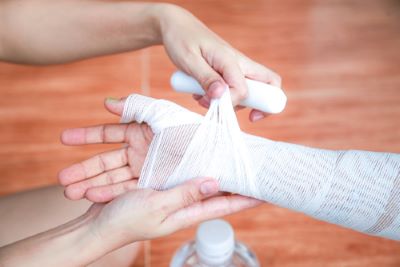 Bandaging burn victim's arm