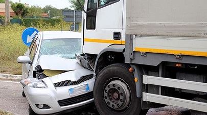 Truck collision with passenger vehicle